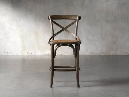 Cadence Stool, natural weathered dark brown oak wood, X-back, curved legs, handwoven natural seagrass rattan seat.