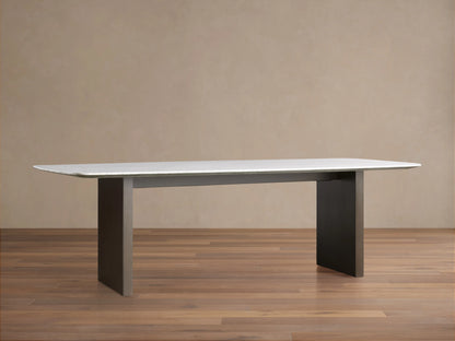 Alt text: Close-up of Saint Germain Stone Dining Table featuring a Carrara marble tabletop with visible natural veining.