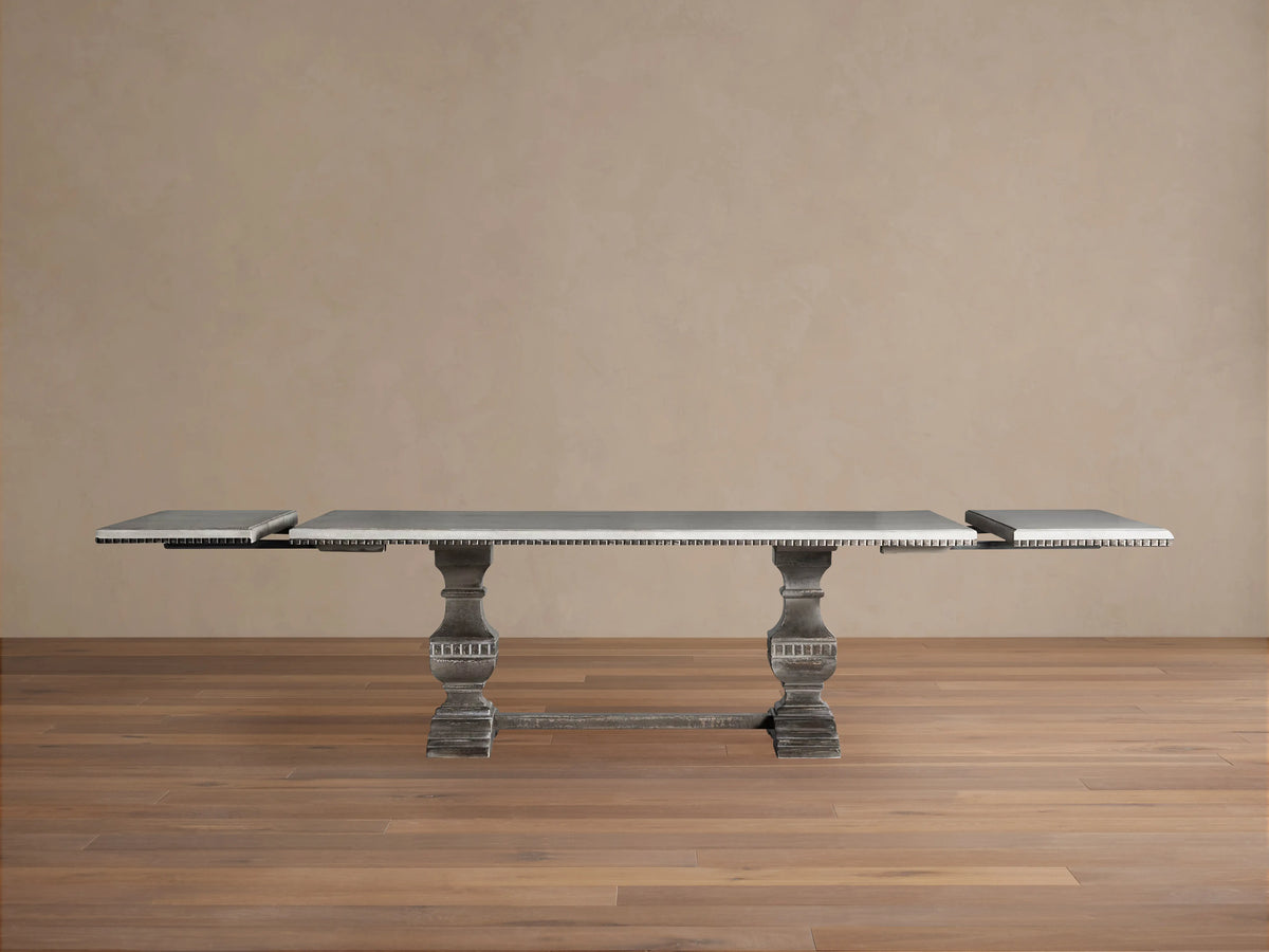 Cerea Amalfi Bell'Arte Dining Table. Rectangular dark top, white hand-painted border, distressed grey double pedestal base.