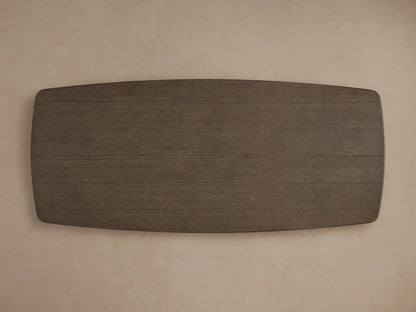 Saint Germain Wood Dining Table viewed from above, showcasing a solid oak surface with a dark brown finish, set against a neutral background.