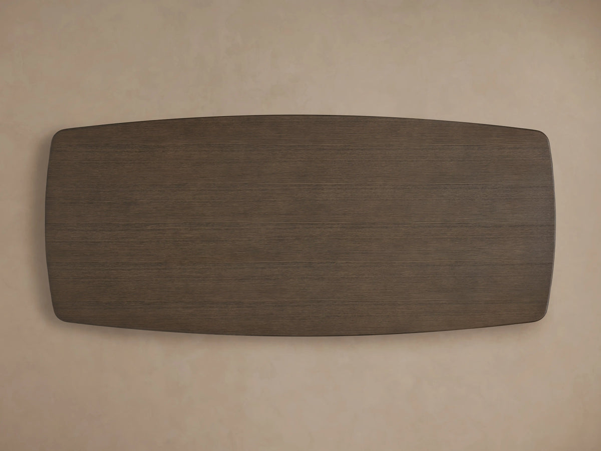 Saint Germain Wood Dining Table with a sleek, rectangular oak top in a rich chestnut finish, viewed from above against a neutral background.