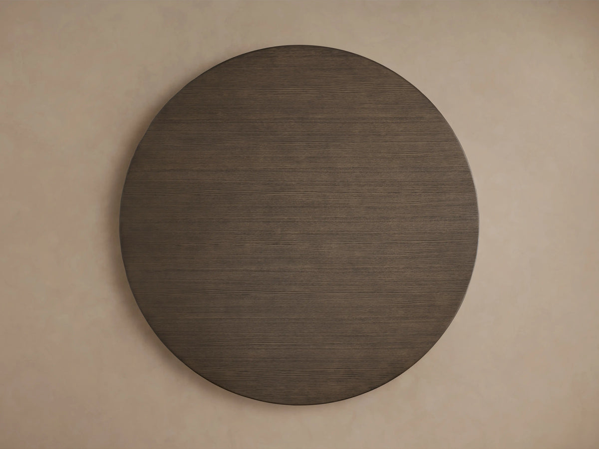 Saint Germain Round Wood Dining Table with a dark oak finish viewed from above, showcasing its circular shape and textured surface.