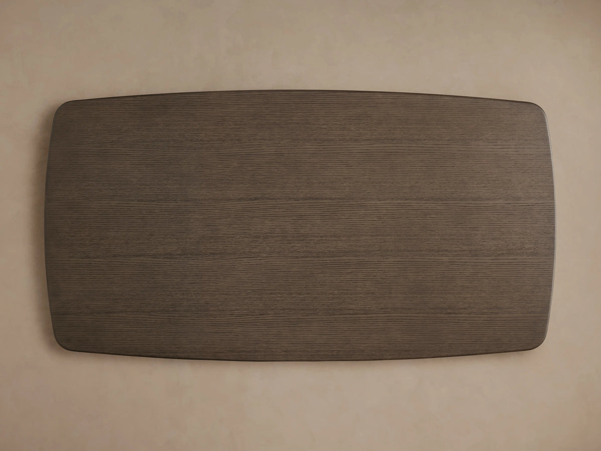 Saint Germain Wood Dining Table viewed from above, showing a rectangular solid oak tabletop with a smooth, dark finish.