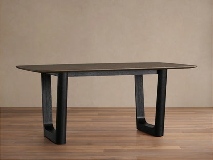 Saint Germain Wood Dining Table with a rectangular top in dark finish and sturdy, rectangular Rennes base on wooden floor.
