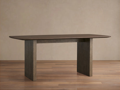 Saint Germain dining table with a rectangular solid oak top, dark finish, and sturdy wooden base on a wood floor.
