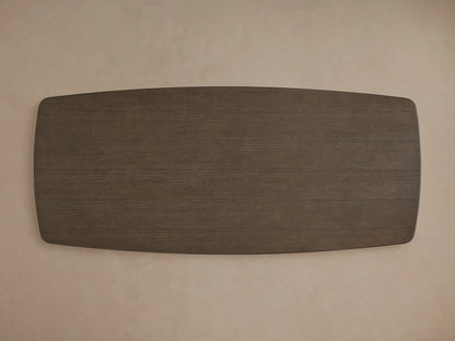 Corner view of the Saint Germain Wood Top Dining Table with a smooth, brown oak surface and beveled edge, against a neutral background.