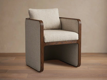 Dempsey Dining Chair in Mocha, oak frame, beige fabric, square shape, plush seat and backrest, on wooden floor.