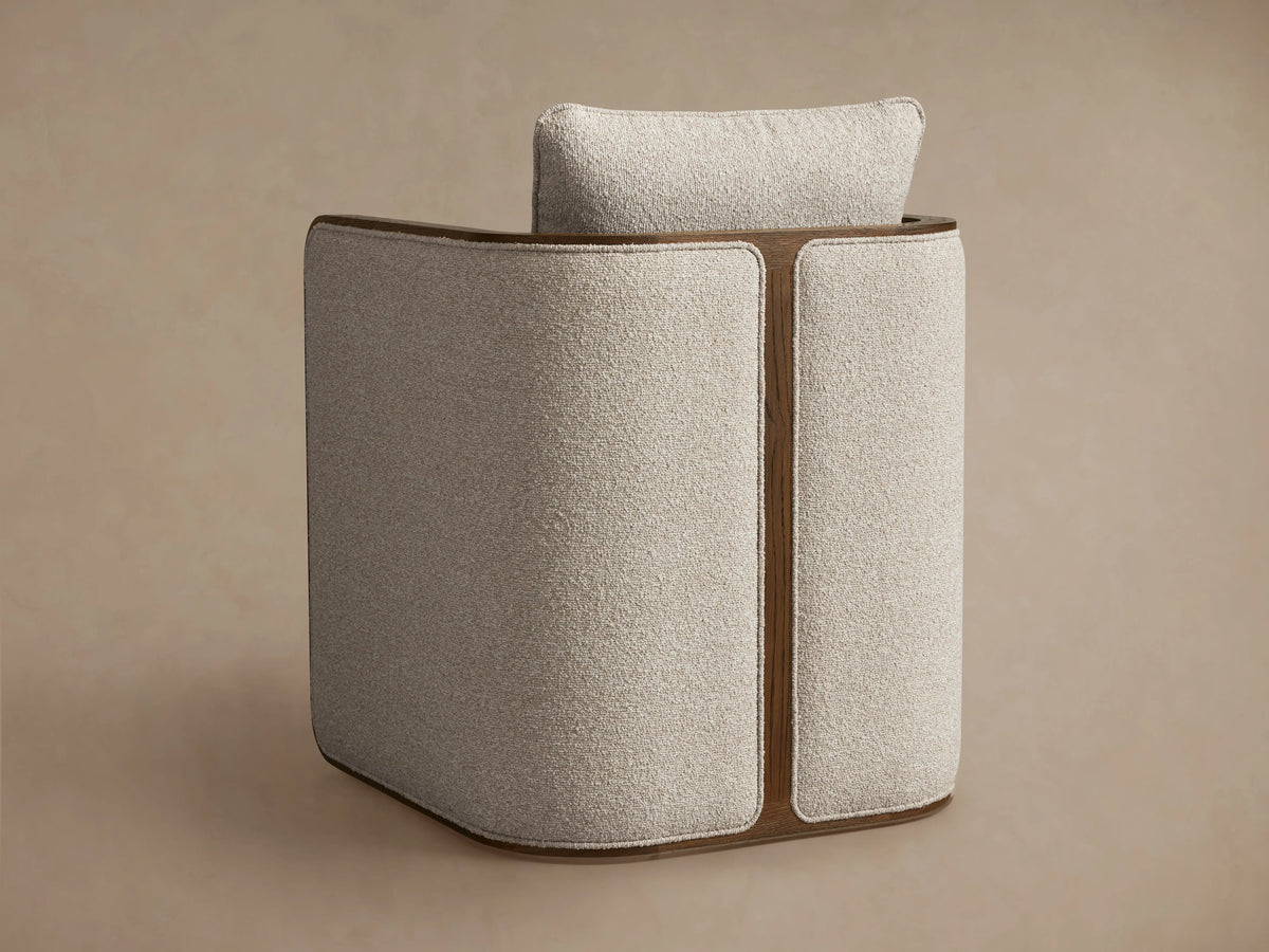 The Dempsey Dining Chair in Mocha features an oak wood frame and textured fabric in light beige, viewed from above and behind.