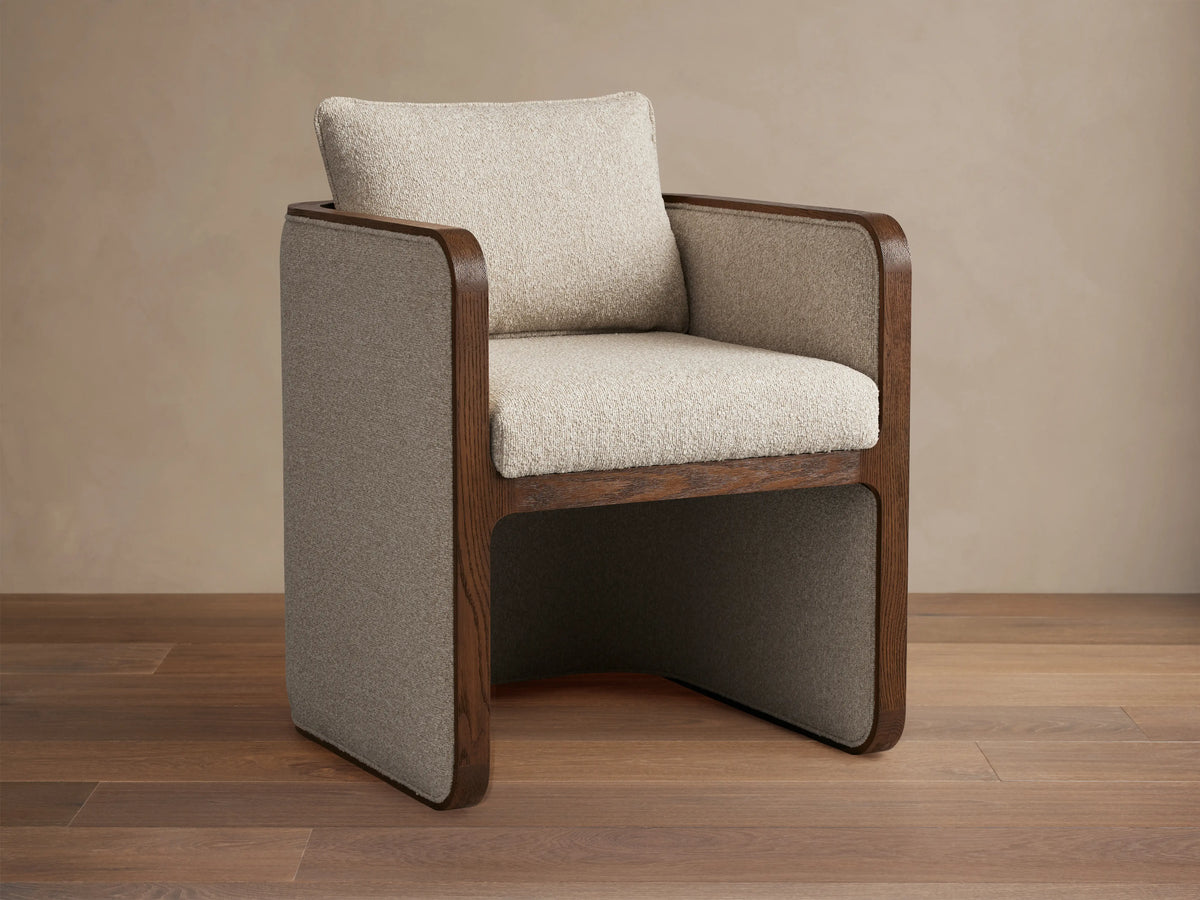 Dempsey Dining Chair in Mocha, featuring oak frame and soft, durable beige upholstery, with mocha trim accents, back view.