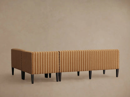 Eaton Banquette close-up: camel-colored fabric with narrow cream pinstripes. Vertical on back, horizontal on seat and arm.