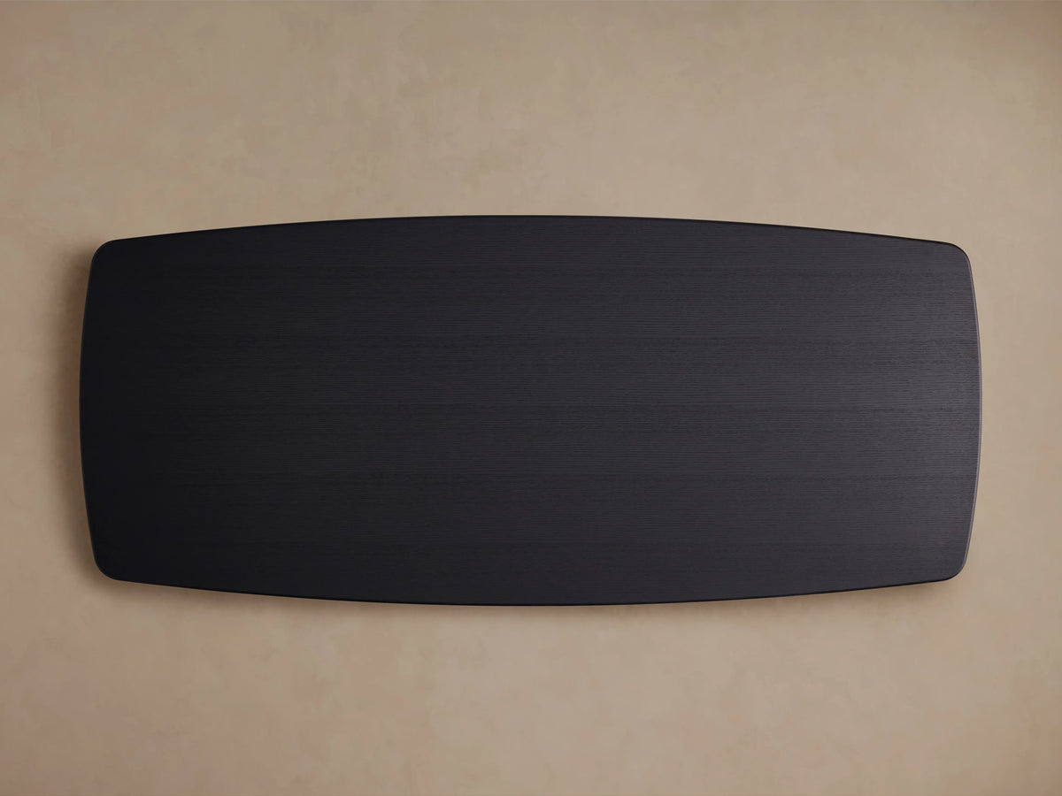 Top view of Saint Germain Wood Dining Table in Ebony finish, showcasing a dark solid oak surface with rounded corners.