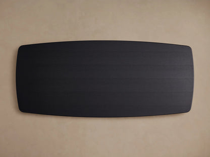 Top view of the Saint Germain Wood Dining Table's rectangular solid oak tabletop finished in Ebony, on a neutral background.