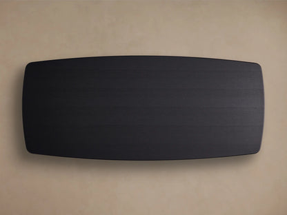 Corner of the Saint Germain Wood Dining Table showing a rectangular solid oak tabletop with a dark Ebony finish and visible wood grain.