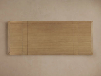 Eletta Dining Table, overhead view of light European white oak tabletop with horizontal grain and darker framed end sections.