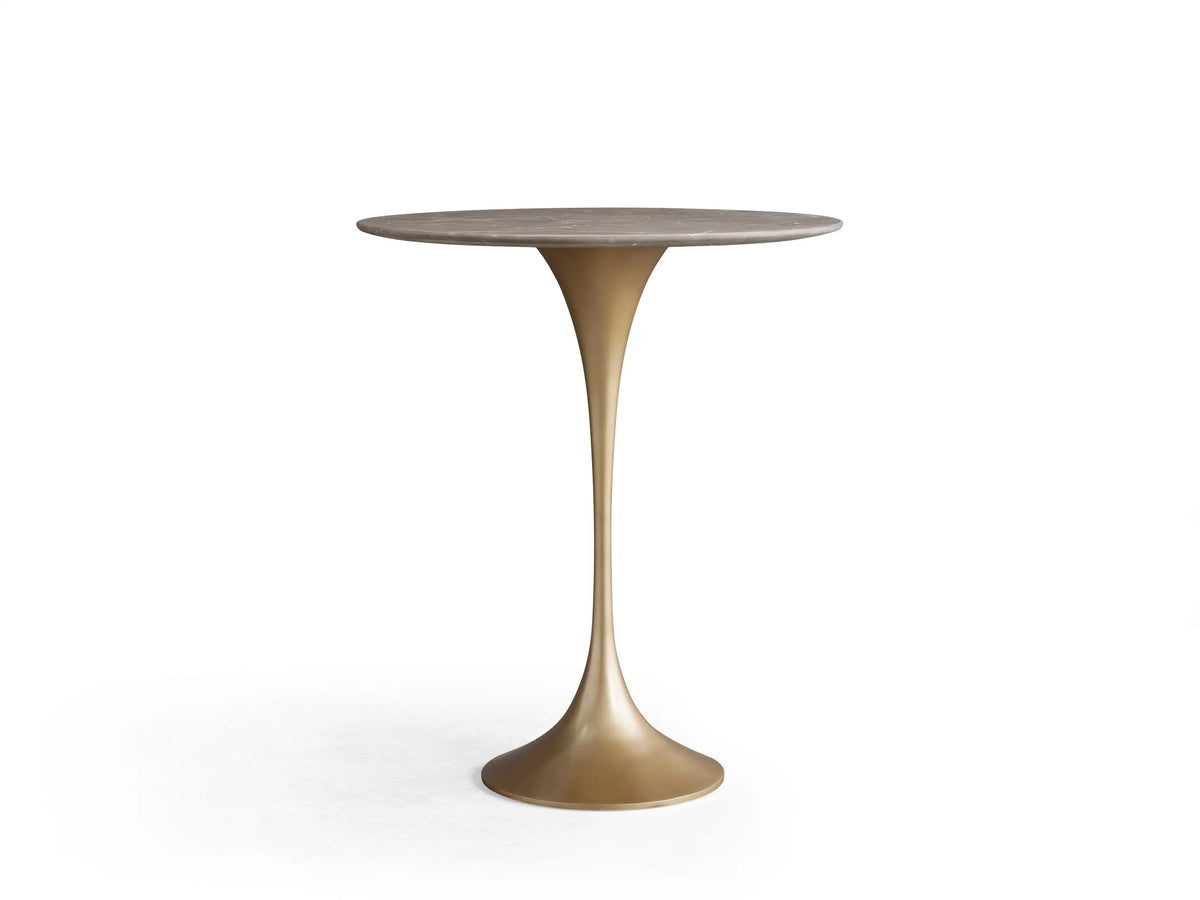 Circular Saint Germain Counter Table with black marquina marble tabletop, featuring natural veining patterns against a beige background.
