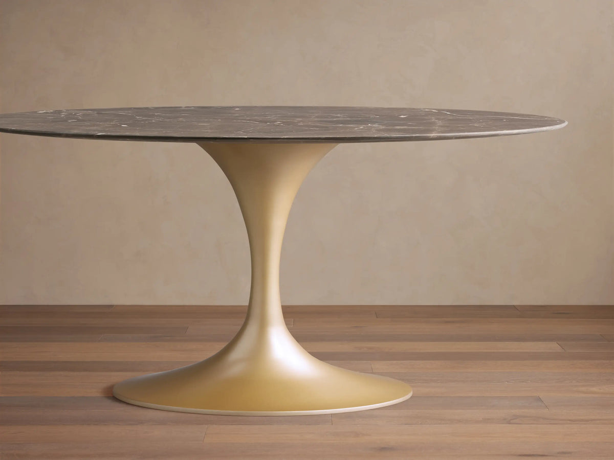 Saint Germain Bistro Table with espresso brown stone top showing natural veining, on a sleek golden steel base.