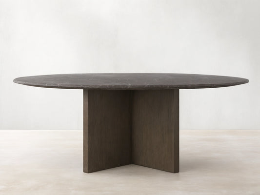 Front view of the Saint Germain Round Stone Top Dining Table with an espresso brown stone top and dark wood Clement Base.
