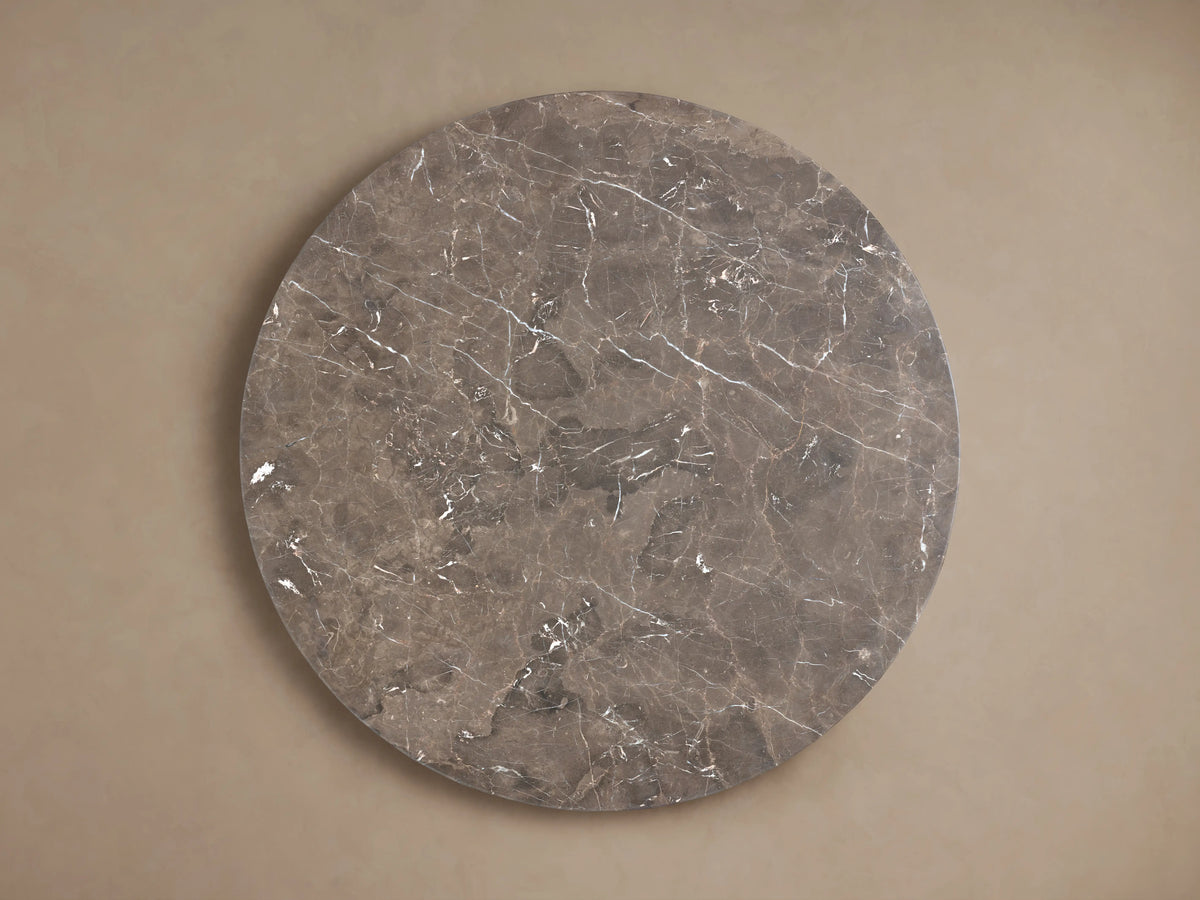 Stone top of the Saint Germain Dining Table, featuring a smooth, espresso brown surface with natural veining and mineral patterns.