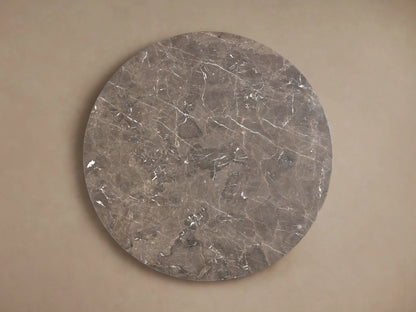 Stone top of the Saint Germain Dining Table, featuring a smooth, espresso brown surface with natural veining and mineral patterns.