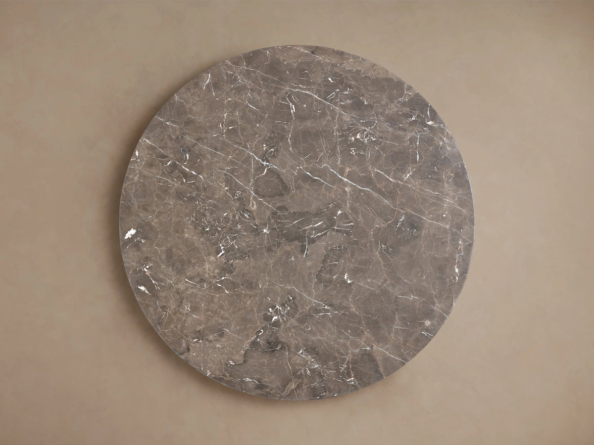 Round espresso brown stone tabletop with natural veining and swirling patterns, displayed on a beige background.