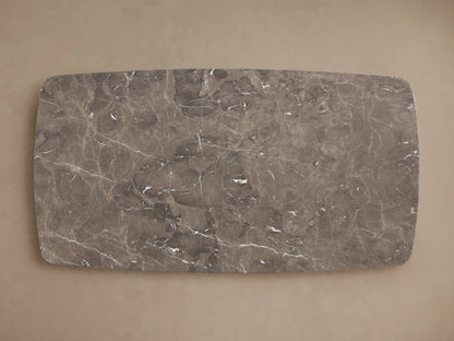 Stone tabletop in espresso brown with natural variations, veining, and swirling patterns. Smooth, rounded corner visible.