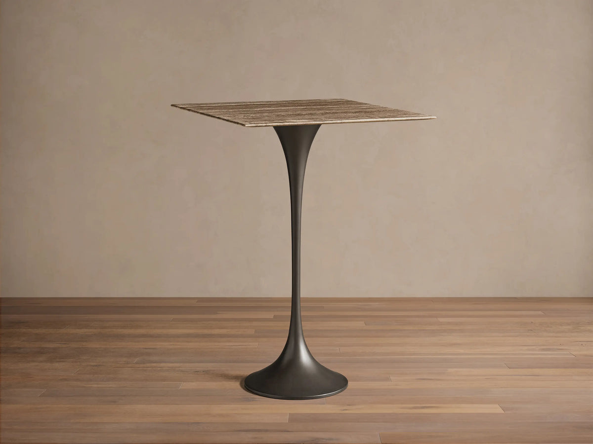 Front view of the Saint Germain Square Bar Table with a light woodgrain square top and a dark tapered pedestal base.