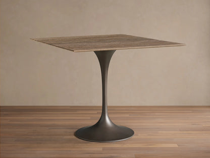 Close-up of the honed brown and beige natural stone surface with distinct horizontal wavy patterns of the Saint Germain Square Bistro Table.