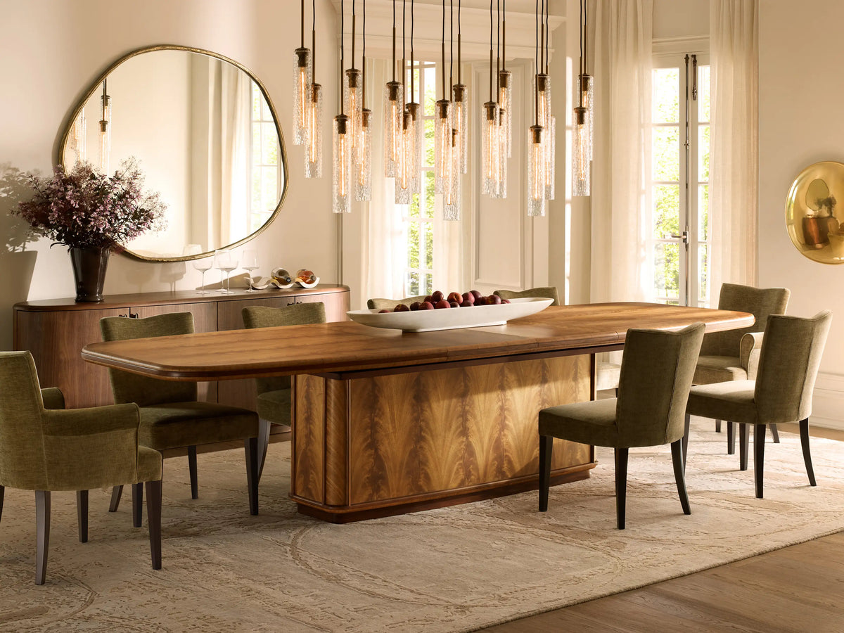 Front view of the cream upholstered Giovanni Dining Arm Chair with dark brown tapered wood legs.