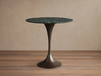 Green marble Saint Germain Bistro Table with swirling patterns and a smooth steel base, showing a close-up of the tabletop texture.