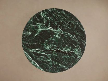 Saint Germain Bar Table with a polished green marble tabletop featuring white veining, supported by a sleek steel base.