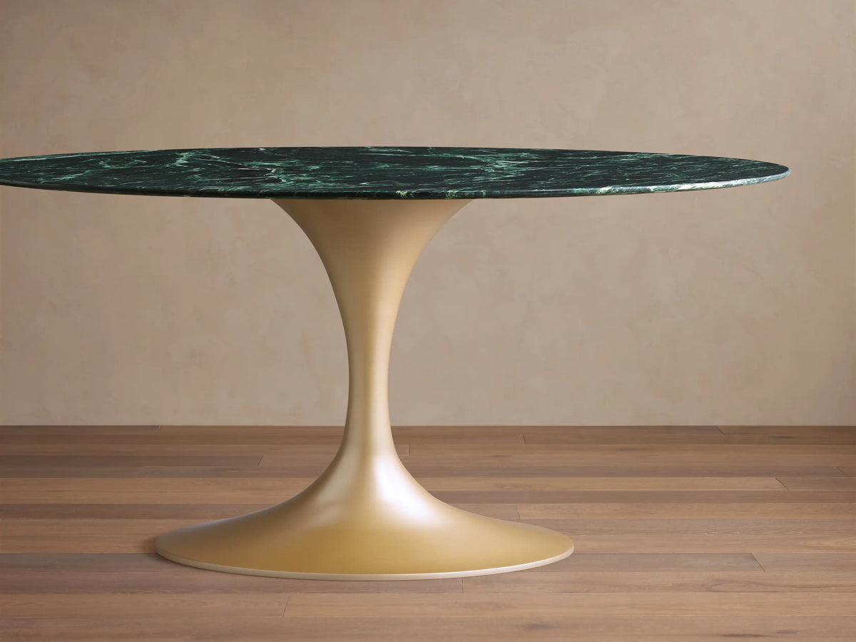 Saint Germain Bistro Table with green marble top featuring natural veining, set on a sleek steel base, angled view.