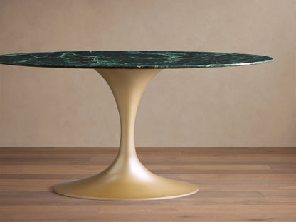 Saint Germain Bistro Table with green marble top featuring natural veining, set on a sleek steel base, angled view.