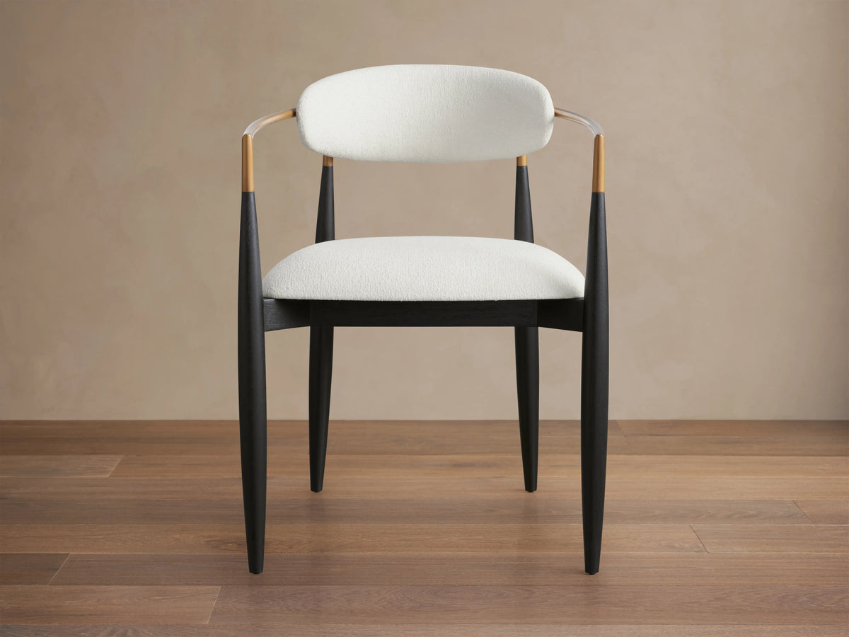 Dark wood Jagger Dining Arm Chair with light beige Cary Linen upholstered seat and curved backrest, showing armrests.