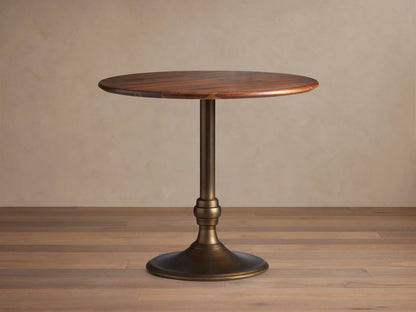Round Jacob Counter Table with a solid walnut top and a Wade Base in brass finish, set against a light neutral background.