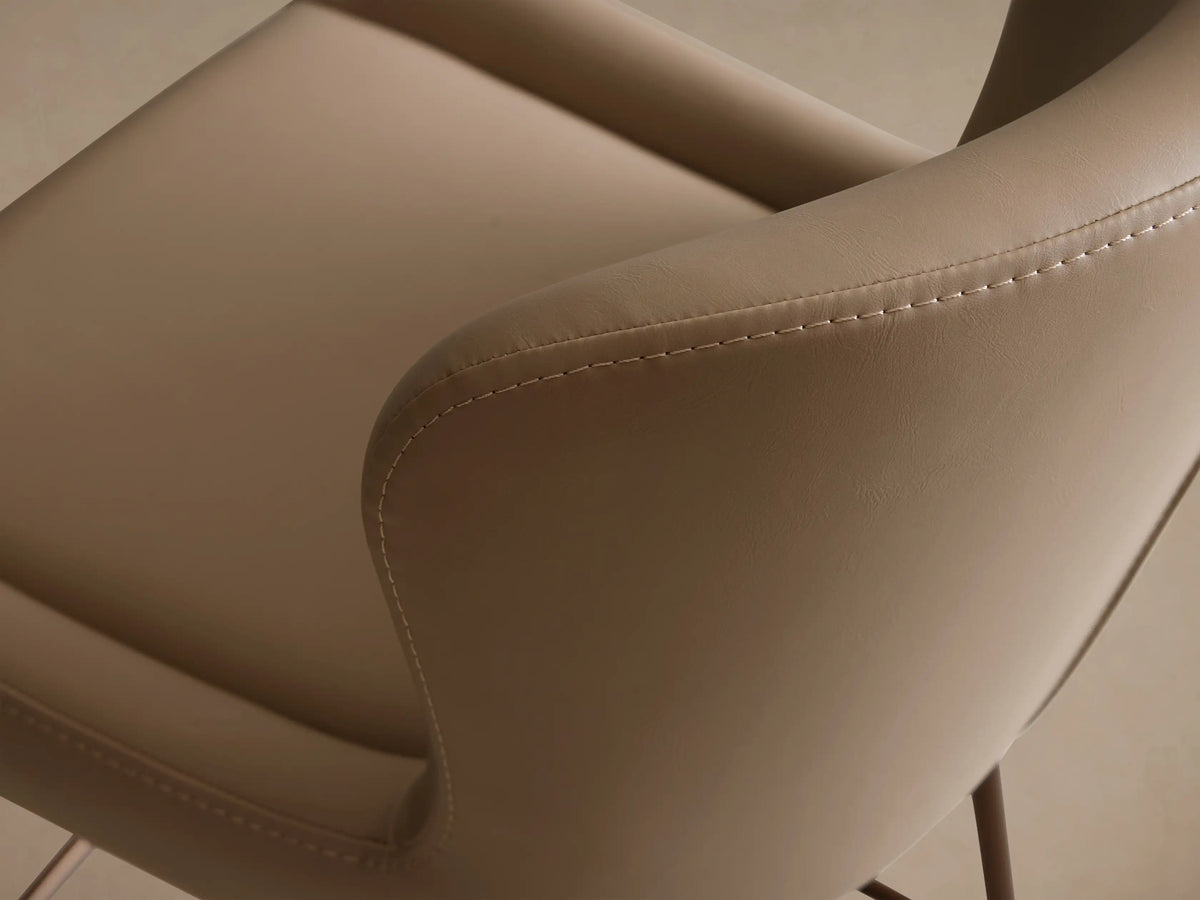 Kirsten Faux Leather Swivel Stool with beige seat and backrest, iron legs with powder-coated finish, on wood floor.