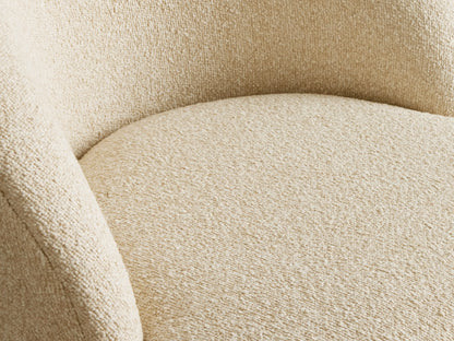 Lindsay Swivel Dining Chair in beige, featuring a rounded back and textured fabric on a conical base. Placed on wooden floor.
