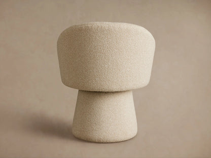 Lindsay Swivel Dining Chair in beige fabric, viewed from the back-left, showcasing its curved backrest and conical base.