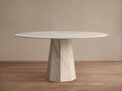 Modena Dining Table: Close-up of smooth, curved beige marble tabletop edge with natural veining, and part of its matching base.