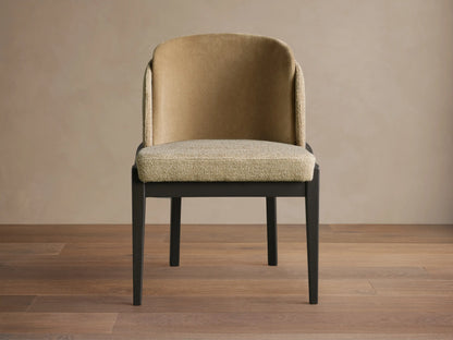 Mena Dining Chair, front view. Dark ash wood frame, curved back with tan inner and textured light beige outer fabric, light beige seat.