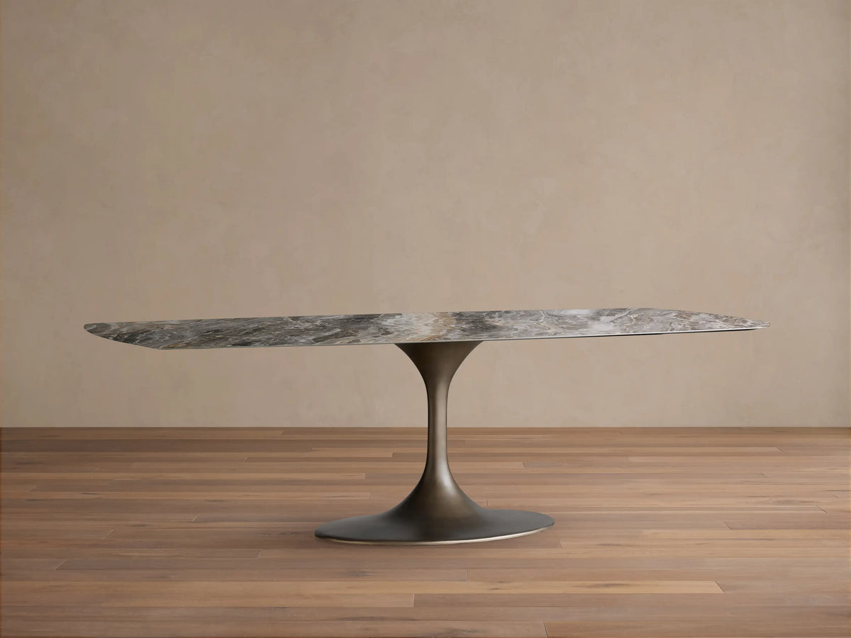 Vincenza Dining Table with Launette Base, featuring a sleek calacatta marble-patterned ceramic top and a sturdy steel base.