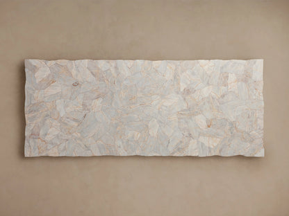 Close-up of Petra Dining Table corner showcasing hand-assembled petrified wood surface with natural patterns and textured edge on a metal base.