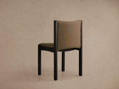 Close-up Paradiso Dining Chair, curved backrest & seat with tan fabric, thin green stripes, dark oak frame.