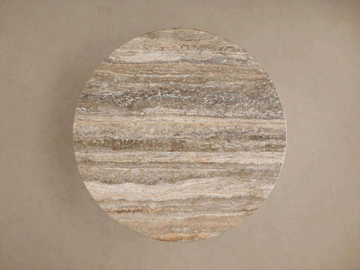 Close-up of Perth Stone Bistro Table top and base, showing natural brown, beige, and cream stone with unique veining.