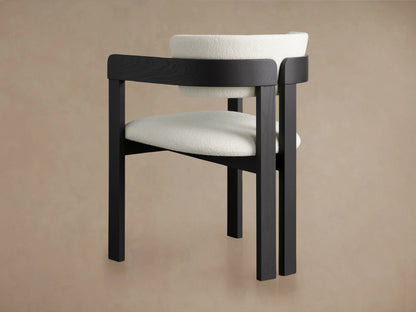 Rodin Dining Arm Chair in ash wood with a dark finish, featuring a light, textured fabric seat and backrest, viewed from above.