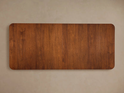 Ross Extension Dining Table in walnut wood with a self-storing extension leaf partially extended, showcasing mid-century design elements.