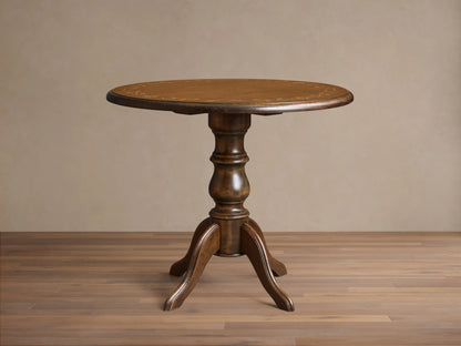 Front view of the brown Stefania Bistro Table with a round top, hand-painted botanical border, and a turned pedestal base.