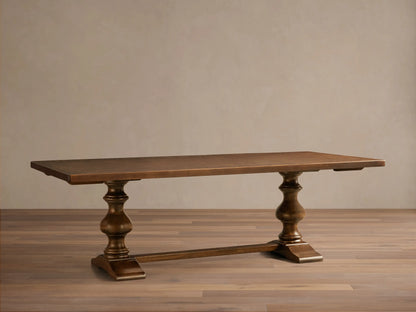 Front view of the dark brown Stefania Oval Extension Dining Table, featuring hand-turned pedestal legs and a subtle botanical tabletop.