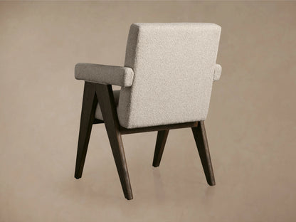 Stanley Dining Arm Chair in Mocha, featuring oak wood legs and Ecru fabric seat and armrests, shown from a side angle.