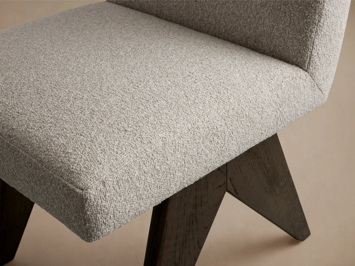 Stanley Dining Side Chair in Mocha with oak wood frame, upholstered in soft, ecru fabric. Chair is centered in the image.