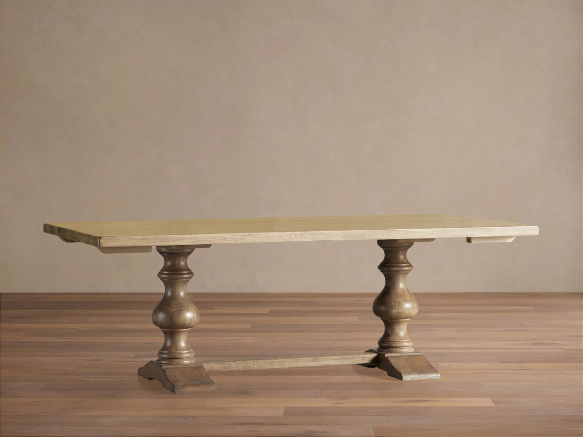 Tuscany Extension Dining Table in warm poplar wood, showing hand-turned pedestal legs, crown molding, and trestle design.